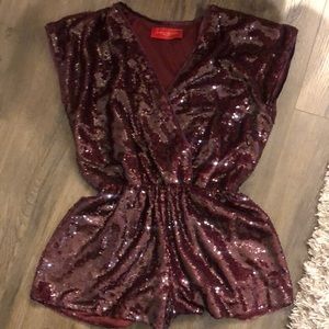 Size small maroon sparkly romper